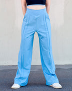 Pantalon azul, holgado, de talle alto cinturilla ajustada y pespuntes decorativos "pintuck" de Vima Studio en talla S.